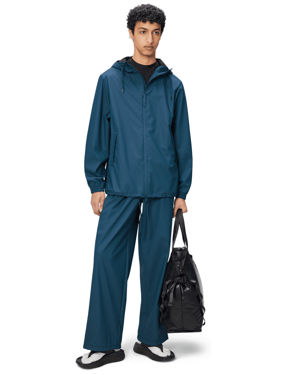 Jas van het merk Rains in het Blauw