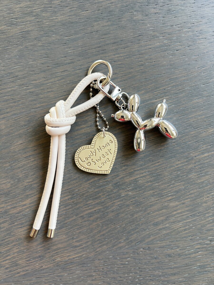 Sleutelhanger van het merk Access in het Beige