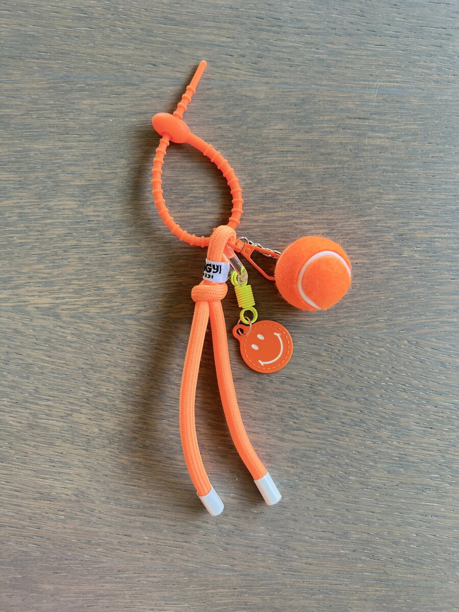 Sleutelhanger van het merk Access in het Oranje