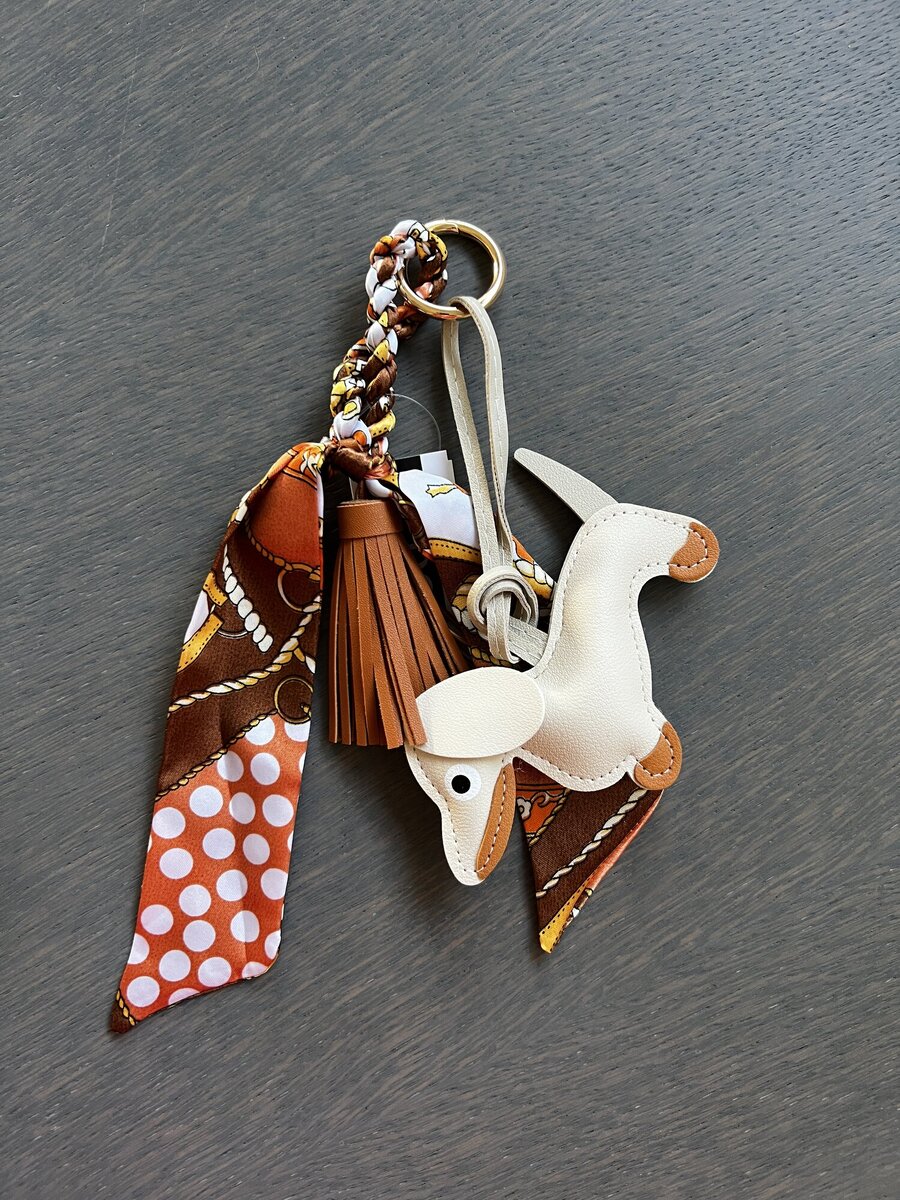 Sleutelhanger van het merk Access in het Beige