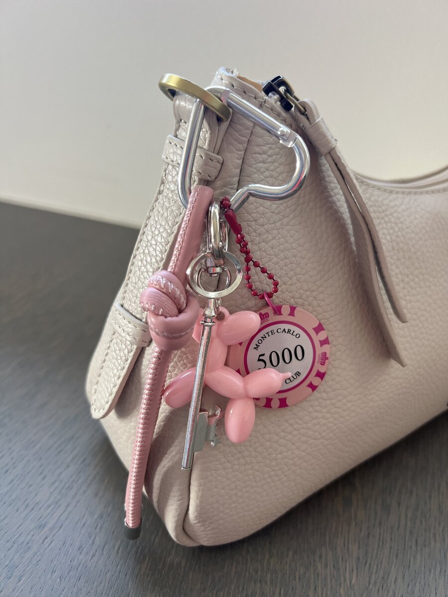 Sleutelhanger van het merk Access in het Roze