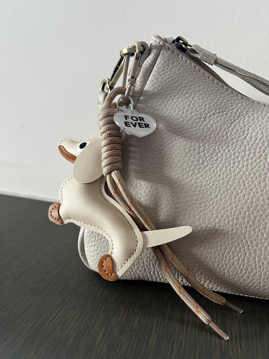 Sleutelhanger van het merk Access in het Beige