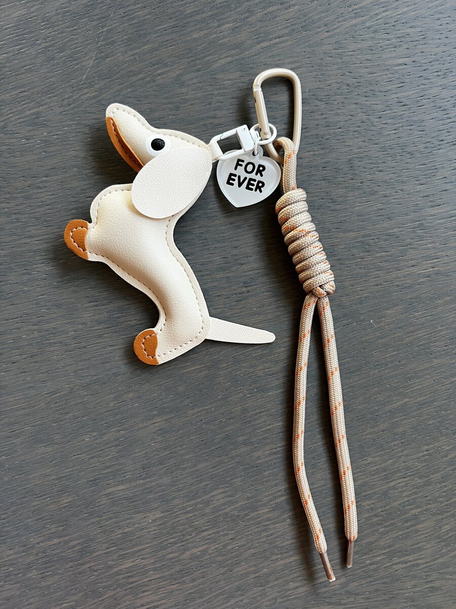 Sleutelhanger van het merk Access in het Beige