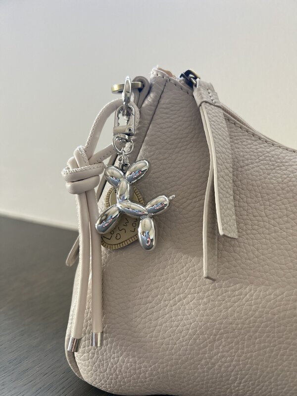 Sleutelhanger van het merk Access in het Beige