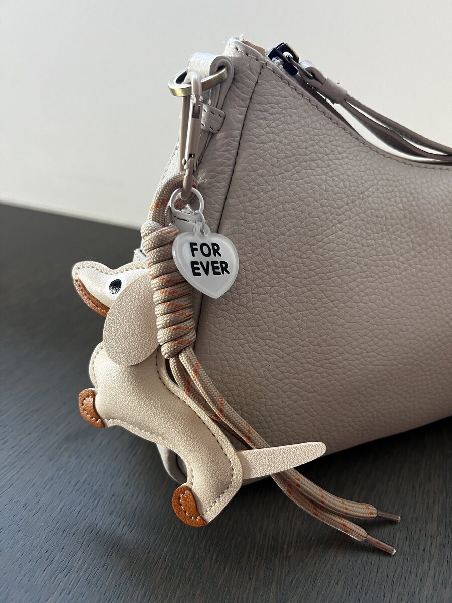 Sleutelhanger van het merk Access in het Beige