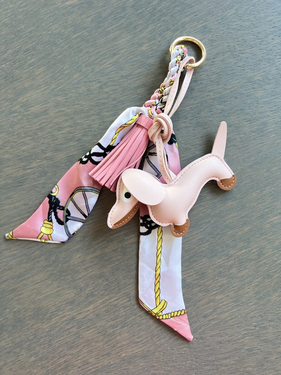 Sleutelhanger van het merk Access in het Roze