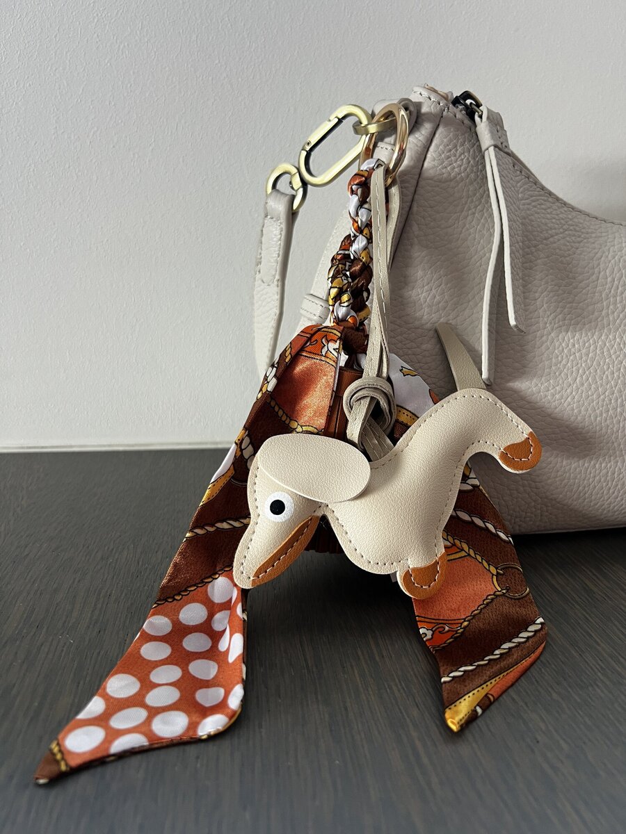 Sleutelhanger van het merk Access in het Beige