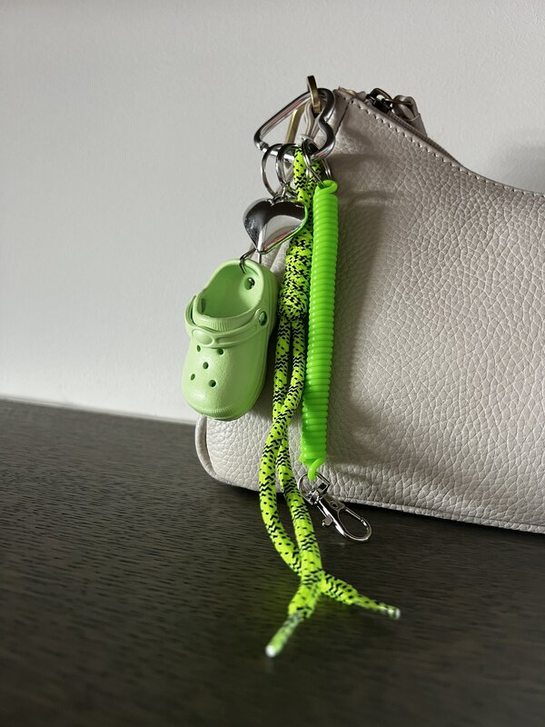 Sleutelhanger van het merk Access in het Groen