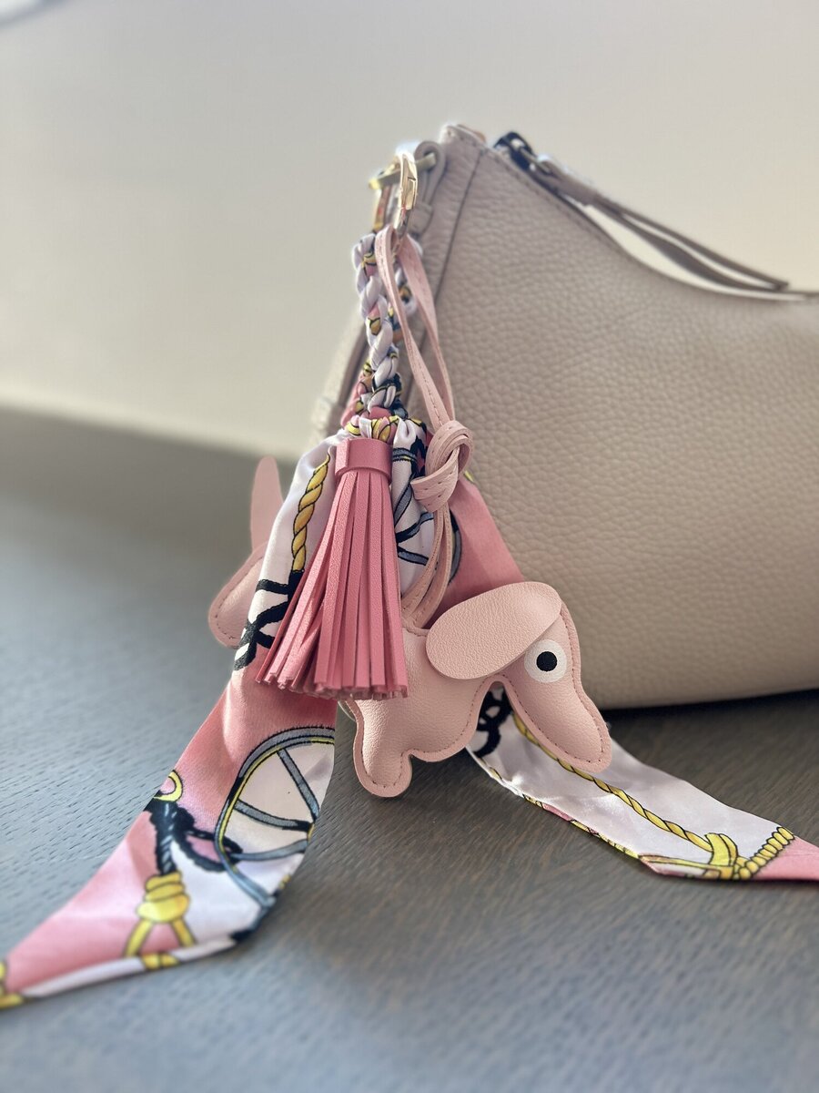 Sleutelhanger van het merk Access in het Roze
