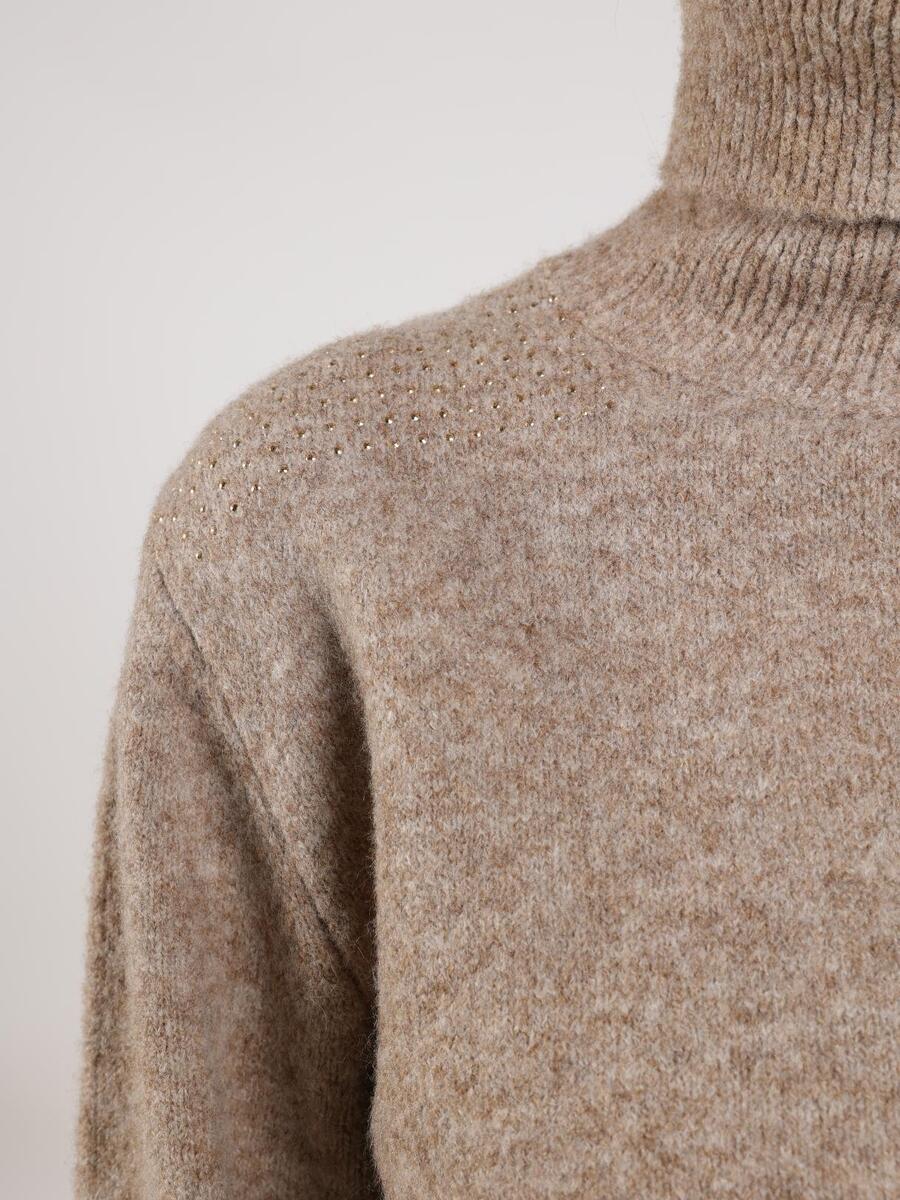 Pull van het merk Nukus in het Beige
