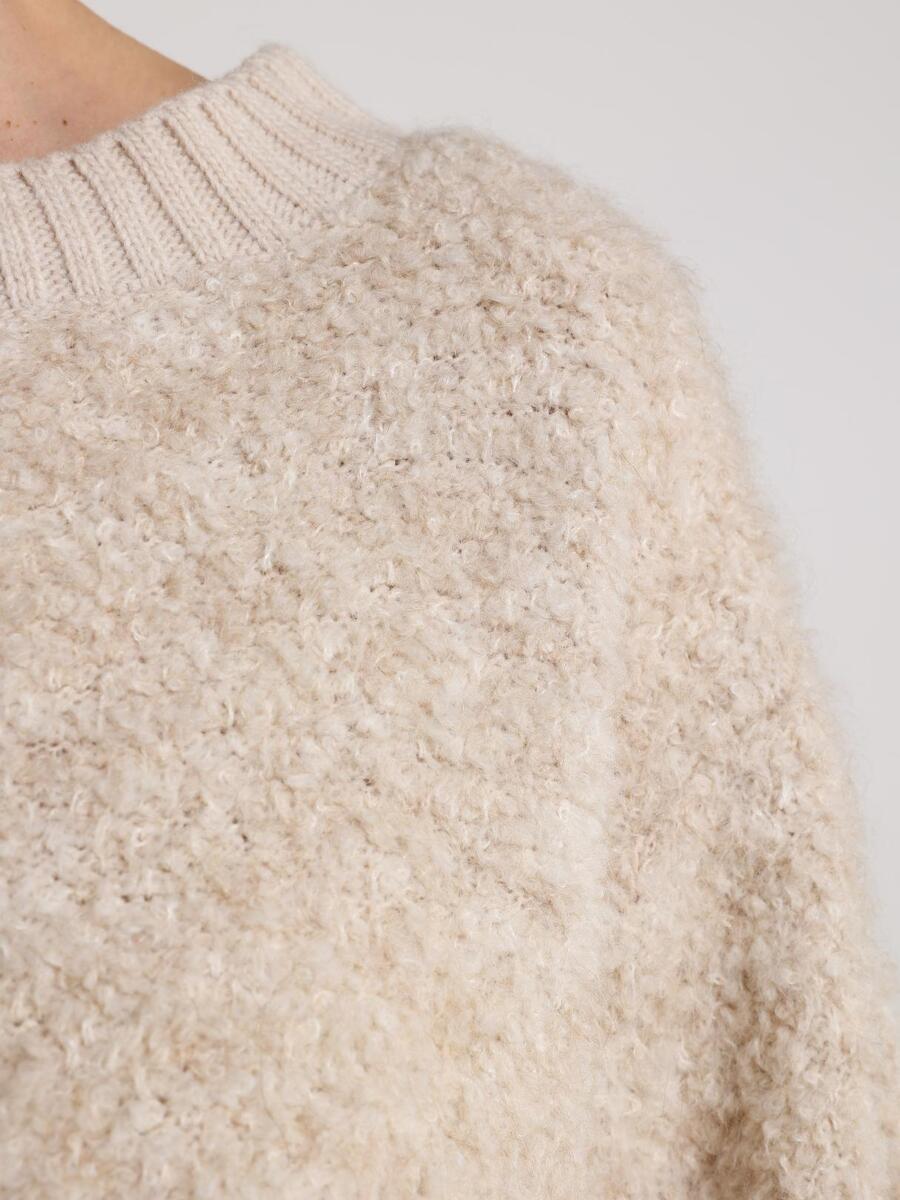 Pull van het merk Nukus in het Beige