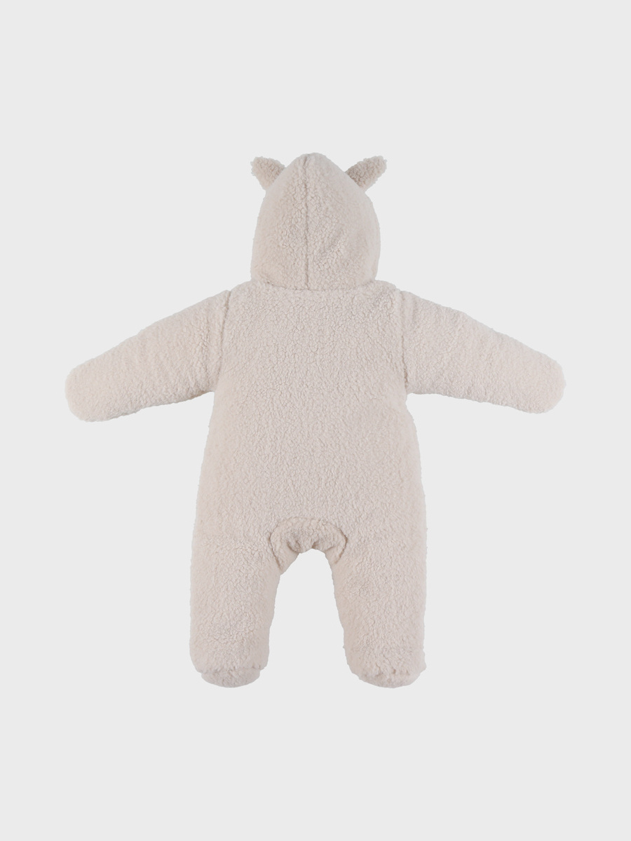 Onepiece van het merk Noukies in het Beige