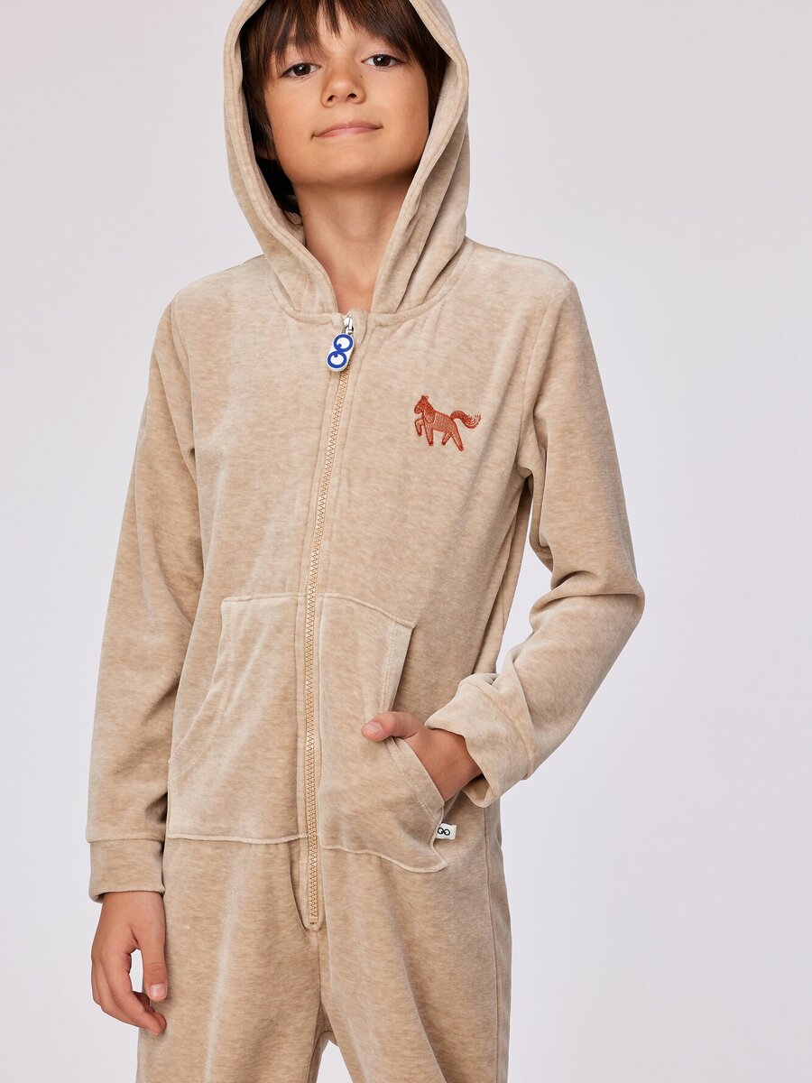 Onesie van het merk Woody in het Beige