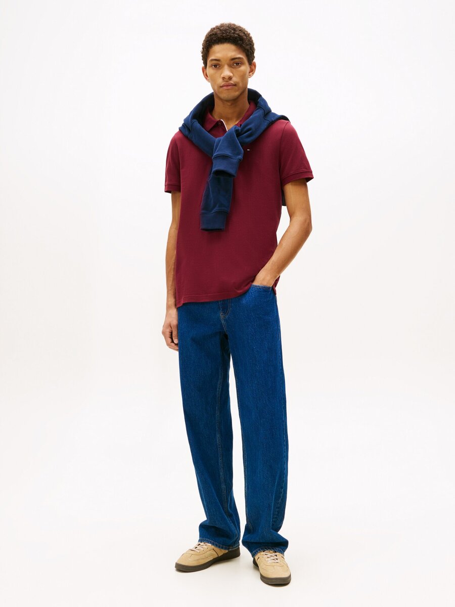 Polo van het merk Tommy Jeans in het Rood